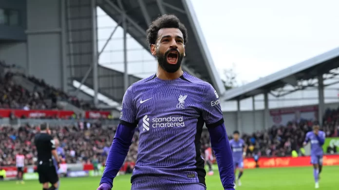 Mohamed Salah merayakan keunggulan 3-0 Liverpool di Brentford